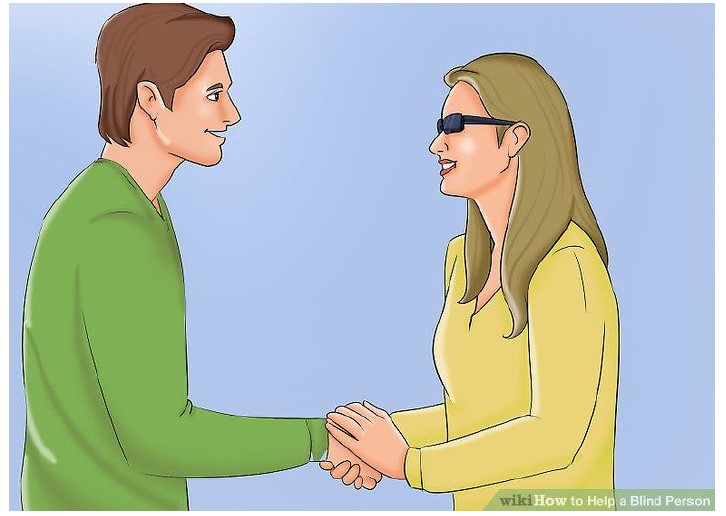 شخص يتحدث مع شخص اخر ويمسك بيده